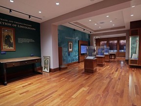 In this Thursday, Nov. 2, 2017 photo, display cases can be seen in the entrance of the interactive Frank and Virginia Williams Collection of Lincolniana Gallery, which is adjacent to the Ulysses S. Grant Presidential Museum inside the Mitchell Memorial Library, Mississippi State University's main library in Starkville, Miss. Mississippi State University will launch the new library and exhibit space housing Grant's papers and artifacts on Nov. 30. (AP Photo/Rogelio V. Solis)