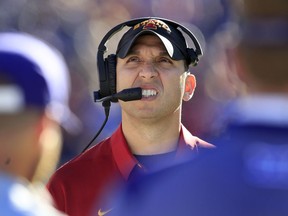 Iowa State head coach Matt Campbell looks at the scoreboard during the first half of an NCAA college football game against Kansas State in Manhattan, Kan., Saturday, Nov. 25, 2017. (AP Photo/Orlin Wagner)