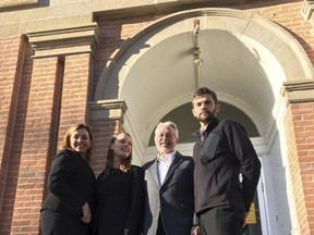 This Nov. 21, 2017, photo provided by the Climate Direct Action group shows Leonard Higgins, second from right, with his defense attorneys outside the Choteau County Courthouse in Fort Benton, Mont. Higgins was convicted Wednesday, Nov. 22, on charges of of criminal mischief and trespassing after he entered a fenced site near Big Sandy, Mont., in October 2016 and closed a valve on a pipeline carrying crude oil from Canada to the United States to call attention to climate change. With Higgins are attorney Lauren Regan, left; attorney Kelsey Skaggs, second from left, and attorney Herman Watson. (Nicole Bradford/Climate Direct Action via AP)