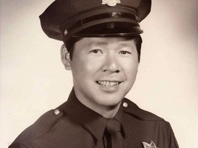 This undated photo released by the San Francisco Police Department shows Herb Lee, San Francisco's first Chinese-American police officer. The San Francisco Chronicle reports that Lee died Nov. 1, 2017, of colon cancer. Lee joined the police force in 1957 and spent his first years working undercover in Chinatown. He retired in 1987.  (San Francisco Police Department via AP)