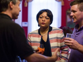 FILE - In this Sept. 22, 2017 file photo, New Orleans mayoral candidate LaToya Cantrell listens to donors at the home of Robert Ripley in New Orleans. On Saturday, Nov. 18, 2017, Cantrell and former municipal Judge Desiree Charbonnet were in a runoff that would determine which one would become the first woman elected to serve as New Orleans' mayor. (Sophia Germer/The Advocate via AP)