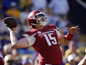 Arkansas quarterback Cole Kelley (15) throws a pass in the second half of an NCAA college football game against LSU in Baton Rouge, La., Saturday, Nov. 11, 2017. LSU won 33-10. (AP Photo/Gerald Herbert)