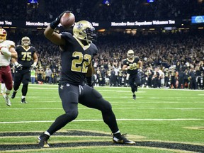 Saints running back Mark Ingram III celebrates after scoring a touchdown as The New Orleans Saints take on The Washington Redskins in the Mercedes-Benz Superdome in New Orleans, Sunday, Nov. 19, 2017.   (Scott Clause/The Daily Advertiser via AP)