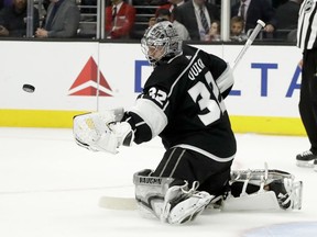 Los Angeles Kings goalie Jonathan Quick blocks a shot by the Vancouver Canucks during the first period of an NHL hockey game in Los Angeles, Tuesday, Nov. 14, 2017. (AP Photo/Chris Carlson)