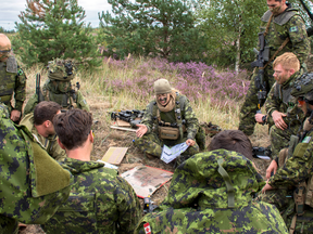 Maj. Chelsea Anne Braybrook, Commander of Bravo Company, 1st Battalion, Princess Patricia’s Canadian Light Infantry briefs Canadian troops in Latvia.