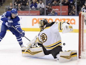 Patrick Marleau of the Toronto Maple Leafs scores the game-winning goal against Boston Bruins' goaltender Anton Khudobin in overtime, giving the Leafs a 3-2 victory over the Bruins at the ACC Friday night.