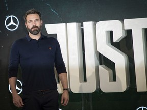 Actor Ben Affleck poses for photographers at a photo call to promote the film 'Justice League', in London, Saturday, Nov. 4, 2017. (Photo by Vianney Le Caer/Invision/AP)