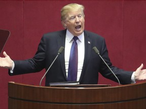 U.S. President Donald Trump delivers a speech at the National Assembly in Seoul, South Korea, Wednesday, Nov. 8, 2017.  President Trump delivered a sharp warning to North Korean leader Kim Jong Un on Wednesday, telling him the weapons he's acquiring "are not making you safer. They are putting your regime in grave danger." (AP Photo/Lee Jin-man, Pool)