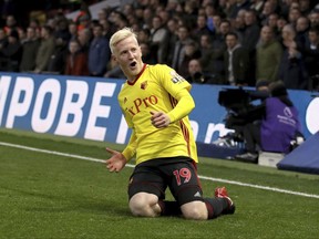 Watford's Will Hughes celebrates scoring his side's first goal of the game during their English Premier League soccer match against West Ham at Vicarage Road, Watford, England, Sunday, Nov. 19, 2017. (John Walton/PA via AP)