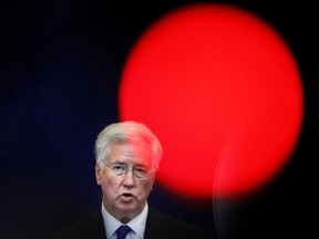 FILE - In this file photo dated Thursday, June 15, 2017, Britain's defense minister Michael Fallon speaks at the Romanian defense ministry in Bucharest, Romania. The scandal surrounding Britain's political class deepened Sunday Nov. 5, 2017, with more allegations of sexual harassment, abuse of power and other misdeeds including new allegations about one of Prime Minister Theresa May's key allies. The swirling allegations go far beyond Damian Green and former Defense Secretary Michael Fallon, who stepped down after reports of inappropriate behavior surfaced. (AP Photo/Vadim Ghirda, File)