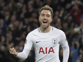 FILE - In this Wednesday, Nov. 1, 2017 file photo, Tottenham's Christian Eriksen celebrates scoring his side's third goal during a Champions League Group H soccer match between Tottenham Hotspur and Real Madrid at the Wembley stadium in London. Christian Eriksen is carrying the hopes of a nation as Denmark looks to qualify for a first major tournament since 2012. (AP Photo/Matt Dunham, File)