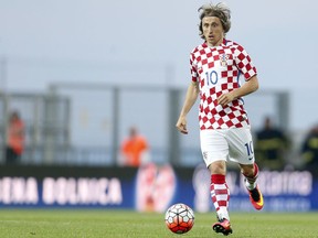FILE - This is a Saturday, June 4, 2016  file photo of Croatia's Luka Modric as he controls the ball during the international friendly soccer match between Croatia and San Marino, in Rijeka, Croatia. Modric Croatia's top player will be well-rested and fully focused when Croatia attempts to secure a World Cup spot in the playoffs against Greece beginning on Thursday Nov. 9, 2017. (AP Photo/Darko Bandic/File)