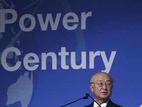 FILE - In this Monday, Oct. 30, 2017 file photo, Yukiya Amano, the head of the International Atomic Energy Agency, speaks at a United Nations conference in Abu Dhabi, United Arab Emirates. The United Nations agency monitoring Iran's compliance with a landmark nuclear treaty issued a report Monday, Nov. 13, 2017 certifying that the country is keeping its end of the deal that U.S. President Donald Trump claims Tehran has violated repeatedly. (AP Photo/Jon Gambrell, File)