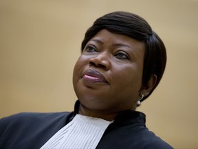 FILE - In this Tuesday, Sept. 29, 2015 file photo, prosecutor Fatou Bensouda in the International Criminal Court in The Hague, Netherlands.  The International Criminal Court prosecutor Bensouda has asked judges to authorize an investigation into various allegations of war crimes in Afghanistan, asserted against the U.S. military, CIA, the Taliban and by Afghan security forces. (AP Photo/Peter Dejong, FILE)