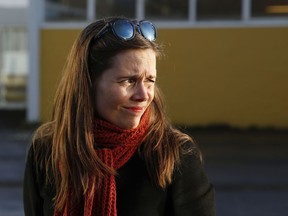 FILE - In this file photo dated Saturday Oct. 28, 2017, Katrin Jakobsdottir leader of the Left Green Movement after casting her ballot, during the general election in Reykjavik, Iceland.   Iceland has announced a broad new governing three-party coalition, Thursday Nov. 30, 2017, with Jakobsdottir as prime minister, a month after Icelanders voted for the third time in four years.(AP Photo/Brynjar Gunnarsson, FILE)