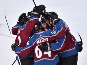 Colorado Avalanches Nail Yakupov (64) celebrates with team mates after scoring 1-0 in the first period of the NHL Global Series hockey game between Colorado Avalanche and Ottawa Senators at Ericsson Globe in Stockholm, Friday, Nov. 10, 2017. (Erik Simander /TT via AP)