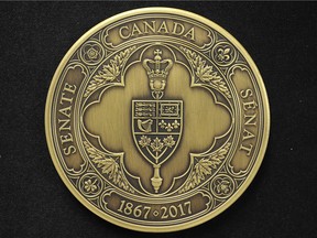 The obverse of the Senate of Canada Sesquicentennial Medal.