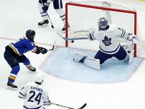 St. Louis Blues' Vladimir Sobotka, left, of the Czech Republic, scores past Toronto Maple Leafs goalie Frederik Andersen, of Denmark, as Leafs' Kasperi Kapanen (24), of Finland, watches during the third period of an NHL hockey game Saturday, Nov. 4, 2017, in St. Louis. The Blues won 6-4. (AP Photo/