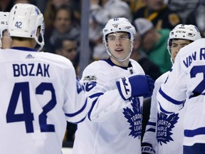 Toronto Maple Leafs' Mitchell Marner celebrates his goal during the first period of game against the  Bruins in Boston on Saturday.