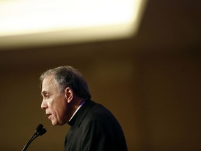 Cardinal Daniel DiNardo of the Archdiocese of Galveston-Houston, president of the United States Conference of Catholic Bishops, delivers remarks at the USCCB's annual fall meeting in Baltimore, Monday, Nov. 13, 2017. (AP Photo/Patrick Semansky)