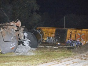 This photo made available by Polk County Fire Rescue, Fla., shows molten sulfur that spilled from a derailed train, Monday, Nov. 27, 2017. State officials are investigating the crash. (Polk County Fire Rescue via AP)