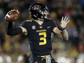 Missouri quarterback Drew Lock throws during the first half of an NCAA college football game against Tennessee, Saturday, Nov. 11, 2017, in Columbia, Mo. (AP Photo/Jeff Roberson)