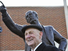 Former Missouri basketball head coach Norm Stewart after the unveiling of a statue in his honor in front of the Mizzou Arena Friday, Nov. 10, 2017, in Columbia, Mo.  (John Sleezer/The Kansas City Star via AP)