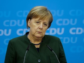 German Chancellor Angela Merkel addresses a new conference after a board meeting of her Christian Democratic Union party at the headquarters in Berlin, Monday, Nov. 27, 2017. (AP Photo/Markus Schreiber)