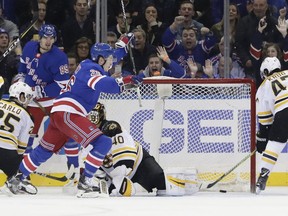 New York Rangers' Jimmy Vesey (26) celebrates after scoring a goal on Boston Bruins goalie Tuukka Rask during the first period of an NHL hockey game Wednesday, Nov. 8, 2017, in New York. (AP Photo/Frank Franklin II)