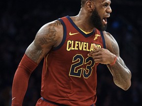 Cleveland Cavaliers' LeBron James complains to the referee during the first half of a NBA basketball game against New York Knicks at Madison Square Garden in New York, Monday, Nov. 13, 2017. (AP Photo/Andres Kudacki)
