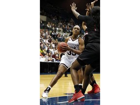 Mississippi State guard Victoria Vivians (35) looks for an opening as Louisiana Lafayette players defend during the first half of an NCAA college basketball game in Jackson, Miss., Wednesday, Nov. 29, 2017. (AP Photo/Rogelio V. Solis)