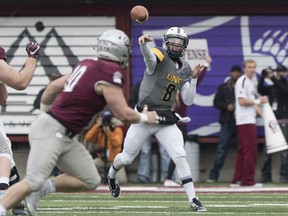 Northern Colorado quarterback Conor Regan (8) throws a pass against Montana in the first quarter of an NCAA college football game Saturday, Nov. 11, 2017, in Missoula, Mont. (AP Photo/Patrick Record)