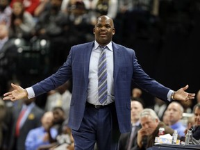 Indiana Pacers coach Nate McMillan questions a call during the first half of the team's NBA basketball game against the New Orleans Pelicans in Indianapolis, Tuesday, Nov. 7, 2017. (AP Photo/Michael Conroy)