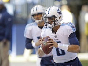 Tennessee Titans quarterback Marcus Mariota warms up before an NFL football game against the Indianapolis Colts, Sunday, Nov. 26, 2017, in Indianapolis. (AP Photo/AJ Mast)