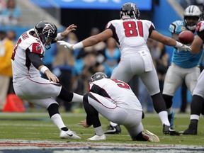 Atlanta Falcons' Matt Bryant (3) kicks a field goal against the Carolina Panthers in the first half of an NFL football game in Charlotte, N.C., Sunday, Nov. 5, 2017. Bryant's status for this week's game against Dallas could be threatened by a calf injury he suffered Sunday. He said he injured his calf in a warmup before the game and then "felt it" when kicking a 53-yard field goal in the first quarter. (AP Photo/Bob Leverone)