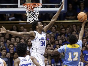 Duke's Wendell Carter Jr. (34) defends against Southern's Jared Sam (12) during the first half of an NCAA college basketball game in Durham, N.C., Friday, Nov. 17, 2017. (AP Photo/Gerry Broome)