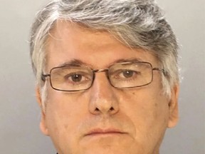 This undated photo provided by the Philadelphia Police Department shows Dr. Ricardo Cruciani, a neurologist charged with groping patients at a Philadelphia clinic. Cruciani is scheduled to appear in court Tuesday, Nov. 21, 2017, on misdemeanor charges that include indecent assault. (Philadelphia Police Department/NJ Advance Media via AP)