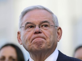 Democratic Sen. Bob Menendez becomes emotional as he speaks to reporters in front of the courthouse in Newark, N.J., Thursday, Nov. 16, 2017. The federal bribery trial of Menendez ended in a mistrial Thursday when the jury said it was hopelessly deadlocked on all charges against the New Jersey politician and a wealthy donor. (AP Photo/Seth Wenig)
