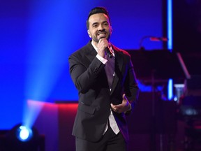 Luis Fonsi performs "Amiga Mia" at the Latin Recording Academy Person of the Year tribute honoring Alejandro Sanz at the Mandalay Bay Convention Center on Wednesday, Nov. 15, 2017, in Las Vegas. (Photo by Chris Pizzello/Invision/AP)
