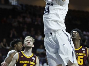 Xavier's Sean O'Mara dunks against Arizona State during the first period of an NCAA college basketball game Friday, Nov. 24, 2017, in Las Vegas. (AP Photo/John Locher)