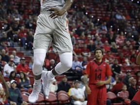 UNLV's Brandon McCoy dunks against Southern Utah during the first half of an NCAA college basketball game Saturday, Nov. 25, 2017, in Las Vegas. (AP Photo/John Locher)