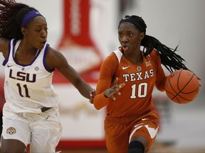 Texas' Lashann Higgs (10) moves the ball downcourt against LSU during the second half of an NCAA college basketball game Friday, Nov. 24, 2017, in Las Vegas. (AP Photo/Marc Sanchez)