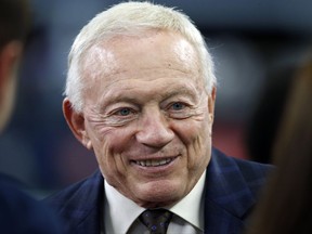 FILE - In this Nov. 24, 2016, file photo, Dallas Cowboys owner Jerry Jones talks on the sideline before the Cowboys played the Washington Redskins during an NFL football game in Arlington, Texas.  Jones has apologized, Friday, Nov. 17, 2017,  after a gossip website posted a 4-year-old video of him making a racially insensitive comment. The Blast website reported the video was shot in 2013 at a Dallas hotel by a white man who asked Jones if he would tape a message for his fiancee. Jones appeared to be joking when he said, "Hey, Jennifer, congratulations on the wedding. Now, you know he's with a black girl tonight, don't you?"  (AP Photo/Ron Jenkins File)
