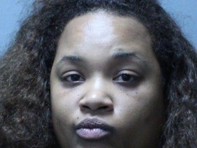 Police said in a statement that  Cross of Springdale, Md., turned herself in to officers Thursday, Nov. 16, 2017 in Maryland's Howard County. She is charged with burglary and theft.   (Howard County, Md. Police via AP)