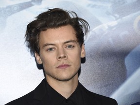 FILE - In this July 18, 2017 file photo, Harry Styles attends the premiere of Warner Bros. Pictures' "Dunkirk" at AMC Loews Lincoln Square in New York.  Styles and R&B star Miguel will perform at the Victoria's Secret fashion show in Shanghai on Monday, Nov. 20. People magazine reports that Tony winner Leslie Odom Jr. and Chinese singer Jane Zhang will also perform at the Mercedes-Benz Arena. The show will air Nov. 28 on CBS.(Photo by Evan Agostini/Invision/AP)