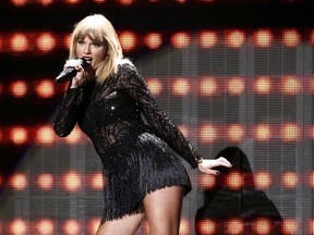 FILE - In this Feb. 4, 2017 file photo, Taylor Swift performs at DIRECTV NOW Super Saturday Night Concert at Club Nomadic in Houston, Texas. Big Machine Records told The Associated Press on Friday that pre-orders for Taylor Swift's "reputation," to be released Nov. 10, 2017 has doubled the pre-orders for Swift's "1989" album a week before its release in 2014. (Photo by John Salangsang/Invision/AP, File)