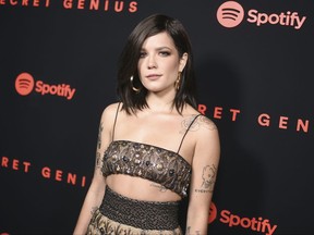 FILE - In this Wednesday, Nov. 1, 2017 file photo, Halsey arrives at the Secret Genius Awards in Los Angeles. For the 2017 American Music Awards, Halsey is the only female act nominated for favorite song _ pop/rock and collaboration of the year, both for the Chainsmokers' No. 1 hit, "Closer," where she is the featured guest. (Photo by Richard Shotwell/Invision/AP)