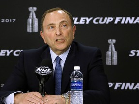 FILE - In this May 29, 2017, file photo, NHL Commissioner Gary Bettman speaks to the media before Game 1 of the NHL hockey Stanley Cup Finals between the Pittsburgh Penguins and the Nashville Predators, in Pittsburgh. As the Supreme Court prepares to hear a challenge to the federal ban on sports betting, U.S. sports leagues are hedging their bets. The leagues are fighting the case in court, but leaders of the NBA, the NHL and Major League Baseball have said publicly that they're open to sports betting being legalized. They're preparing for a future of expanded gambling and hoping to have a say in how legalization takes effect. (AP Photo/Gene J. Puskar, File)