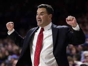 FILE - In this Feb. 11, 2017, file photo, Arizona coach Sean Miller gestures during the first half of the team's NCAA college basketball game against California in Tucson, Ariz.  Miller has the type of team that could end his Final Four-less run. The Wildcats have a strong core of experienced players returning from an Elite Eight team last season to with a stellar recruiting class, highlighted by athletic big man Deandre Ayton. (AP Photo/Rick Scuteri, File)
