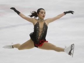 In this Saturday, Sept. 16, 2017 file photo, United States' Karen Chen competes during the free skate at the U.S. International Figure Skating Classic in Salt Lake City. Karen Chen's autobiography just hit the book shelves. The defending U.S. women's figure skating champion authored the book "Finding the Edge" with the help of Natalie England over the past few months. (AP Photo/Rick Bowmer, File)